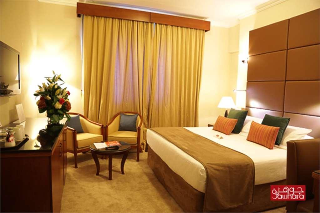 Al Jawhara Gardens Hotel Дубай Номер фото